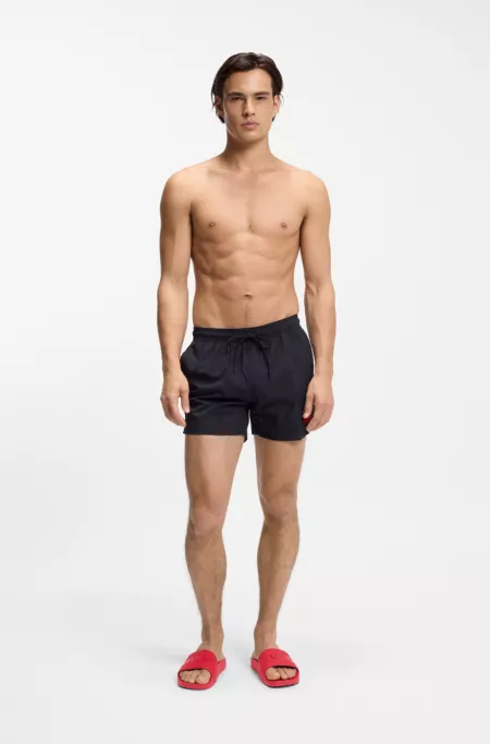 Italian-made slides with tonal logo