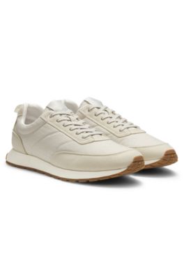 Deportivas estilo zapatillas de correr con empeines con monograma de jacquard, Beige claro