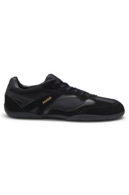 Mixed-material trainers with open mesh, Black