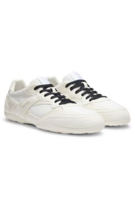 Mixed-material trainers with open mesh, White