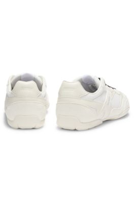 Mixed-material trainers with open mesh, White