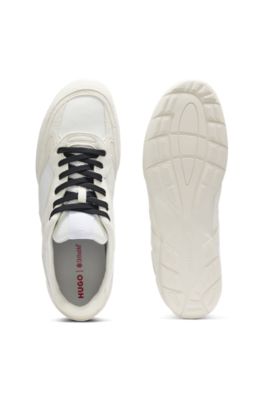 Mixed-material trainers with open mesh, White