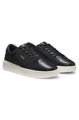 Deportivas de piel de napa con logo en tono dorado, Negro