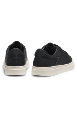Low-top trainers with woven and grained effects, Black