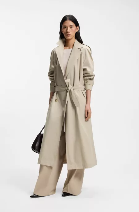 Double-breasted trench coat with low-waist belt