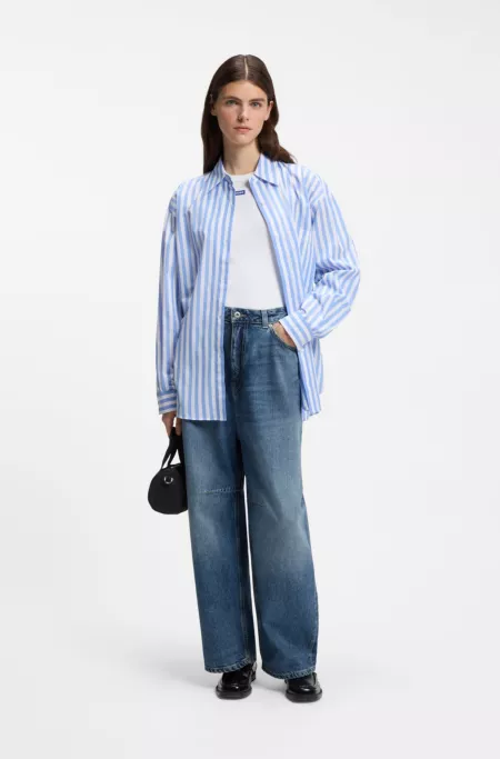 Barrel-leg mid-rise jeans in indigo