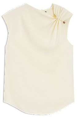 Blusa regular fit en crepé con pin metálico