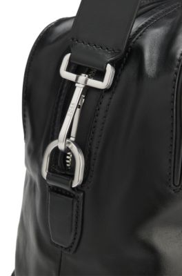 Embossed logo holdall in leather, Black