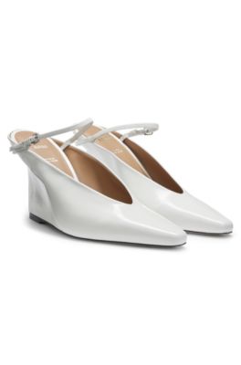 Glossy leather mules with wedge heel and strap, White