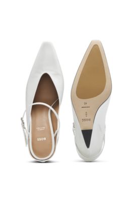 Glossy leather mules with wedge heel and strap, White