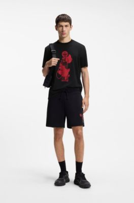 Camiseta de punto de algod&oacute;n con gr&aacute;ficos de rosas e inspiraci&oacute;n motera, Negro