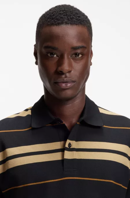 Regular-fit polo in cotton pique with engineered stripes