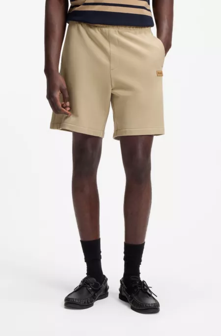 Regular-fit shorts in cotton with suede logo badge