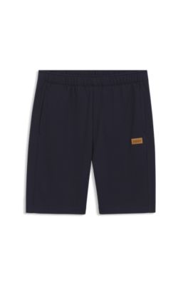 Regular-fit shorts in cotton with suede logo badge, Dark Blue