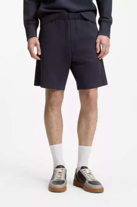Regular-fit shorts in cotton with suede logo badge