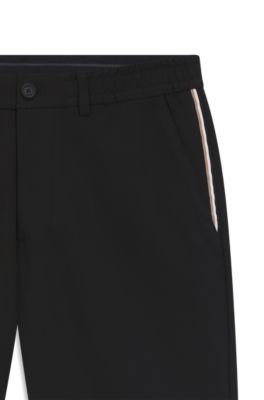 Shorts activos en tejido multiel&aacute;stico repelente al agua, Negro