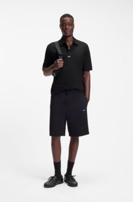 Cotton-piqu&eacute; polo shirt with blue logo badge, Black