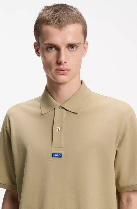 Cotton-piqué polo shirt with blue logo badge