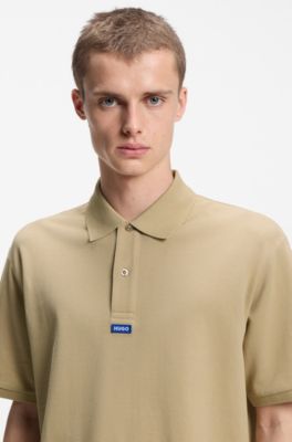 Cotton-piqu&eacute; polo shirt with blue logo badge, Beige