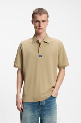 Cotton-piqu&eacute; polo shirt with blue logo badge, Beige