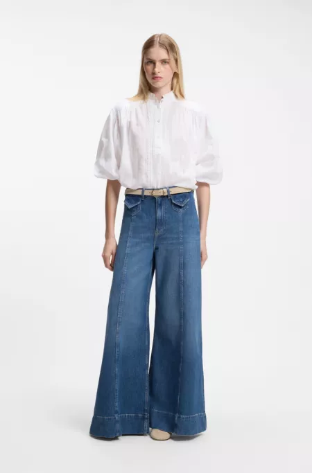 Wide-leg high-rise jeans in vintage-wash denim