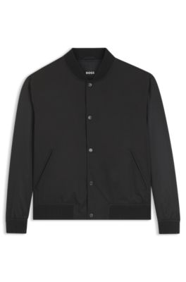 Water-repellent jacket with monogram-patterned sleeves, Black