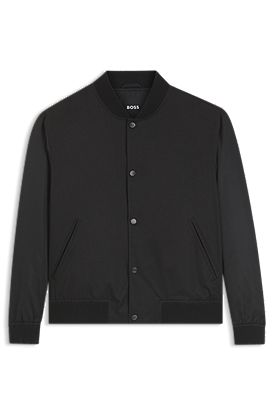 Water-repellent jacket with monogram-patterned sleeves
