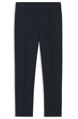 Pantalones slim fit de tejido el&aacute;stico t&eacute;cnico, Azul oscuro