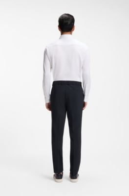 Pantalones slim fit de tejido el&aacute;stico t&eacute;cnico, Azul oscuro