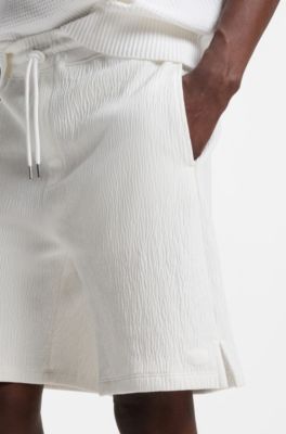 Stretch-cotton shorts with creased effect, White