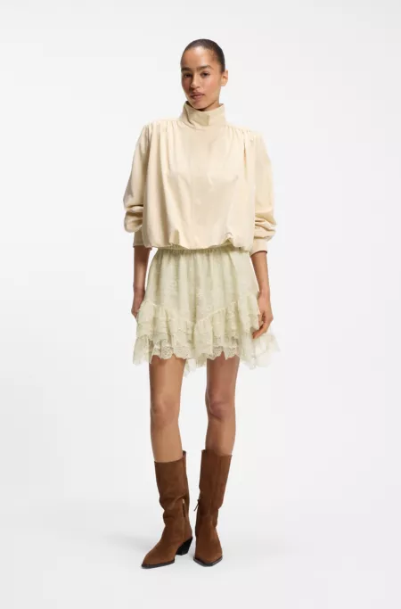 Mini skort in ruffled lace