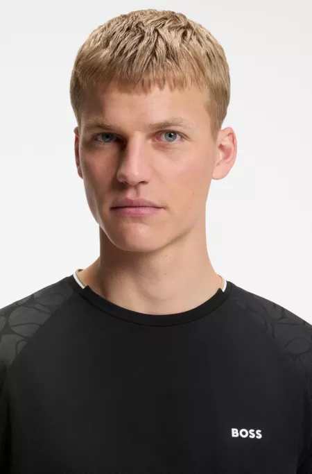 Active moisture-wicking T-shirt with tennis-ball embossing