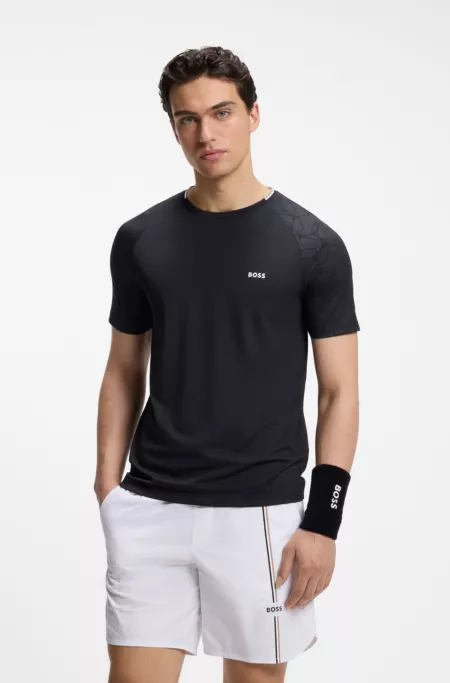 Active moisture-wicking T-shirt with tennis-ball embossing