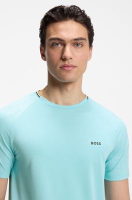 Camiseta activa con absorci&oacute;n de la humedad y grabado de pelota de tenis, Celeste