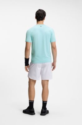 Camiseta activa con absorci&oacute;n de la humedad y grabado de pelota de tenis, Celeste