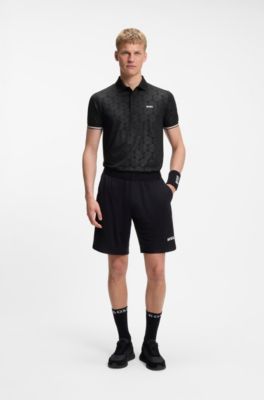 Active Polo slim fit con estampado de pelota de tenis grabado, Negro