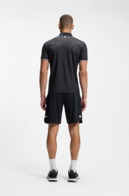 Active Polo slim fit con estampado de pelota de tenis grabado, Azul oscuro