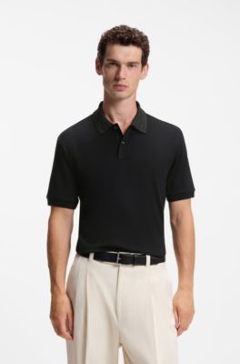 Polo regular fit de algod&oacute;n con cuello estampado, Negro