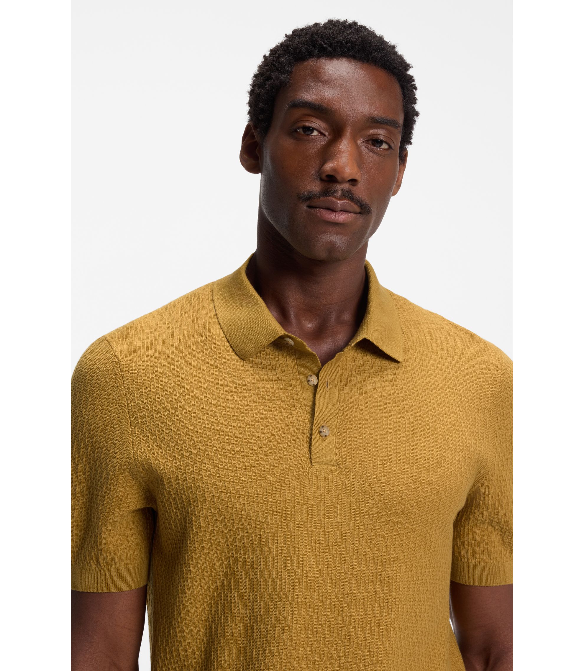 BOSS - Regular-fit knit polo in structured fabric - Gold