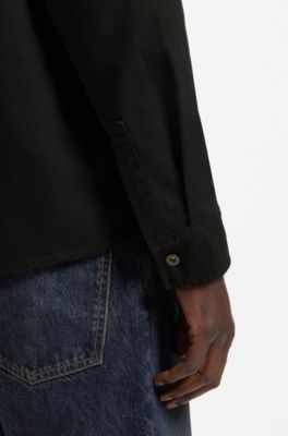 Sobrecamisa oversize fit en lona de algod&oacute;n el&aacute;stico, Negro