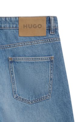 Jean Loose coupe large avec d&eacute;tails breloques, Bleu