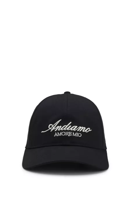 Woven cap with adjustable strap