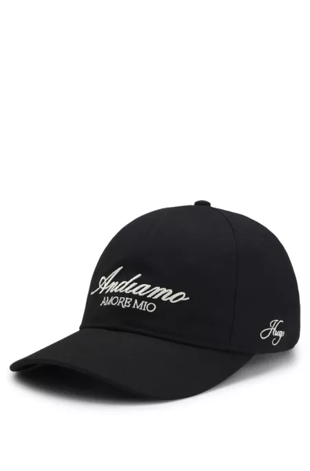 Woven cap with adjustable strap