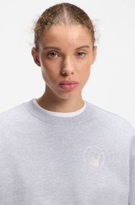 Sudadera relaxed fit en felpa de algod&oacute;n con estampados gr&aacute;ficos, Gris claro