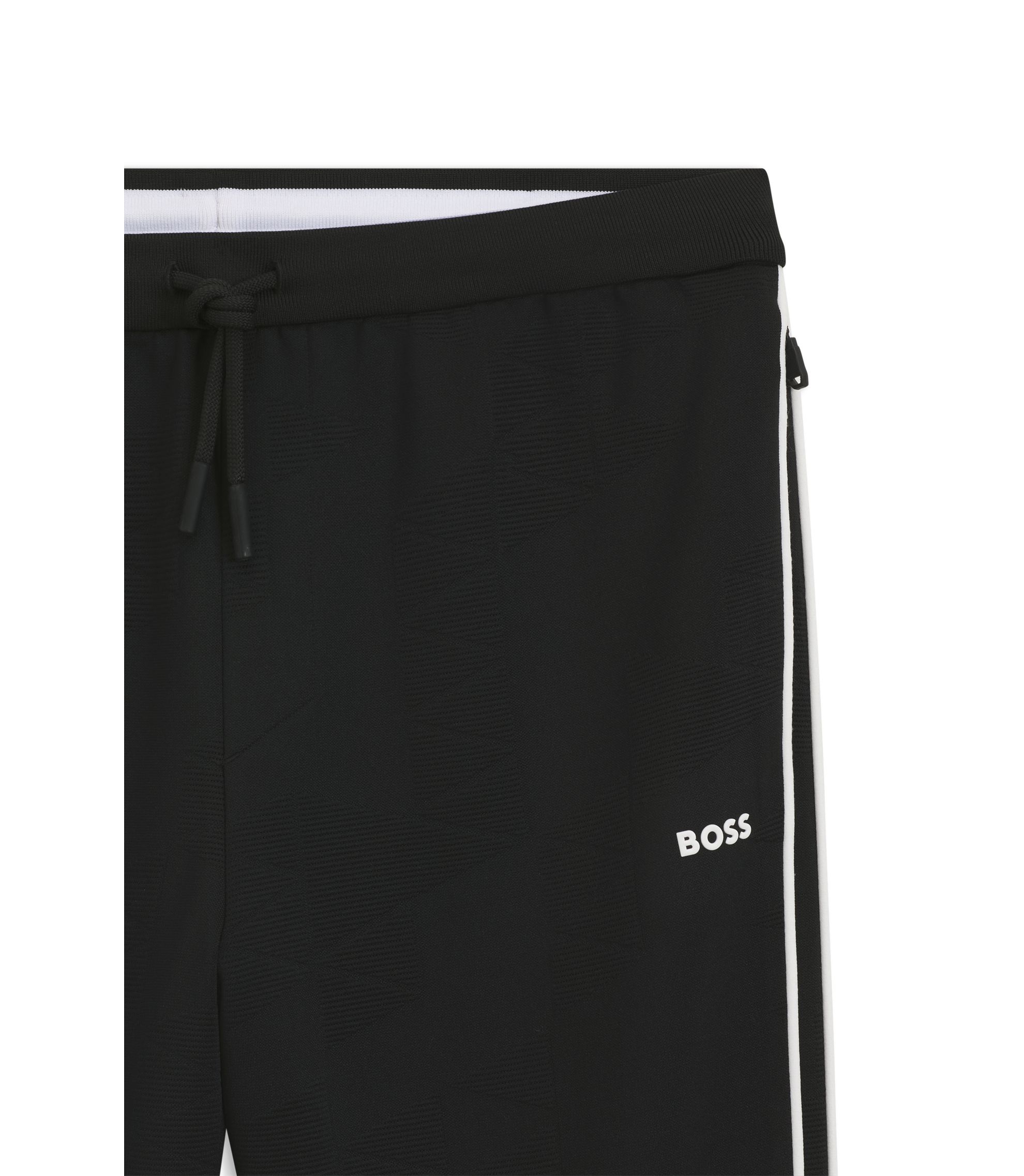 BOSS - Triangle-jacquard track pants with rubberized logo - Black