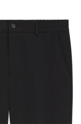 Pantalones tapered fit en punto de algod&oacute;n, Negro