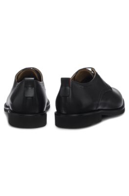 Embossed-logo Derby shoes in leather, Black