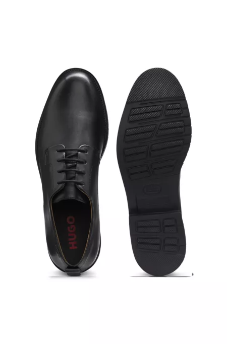 Embossed-logo Derby shoes in leather