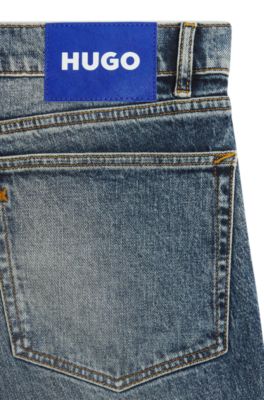 Vaqueros slim fit de denim el&aacute;stico azul medio lavado a la piedra, Azul