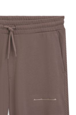 Relaxed-fit cotton pants with streetwear logo, Brown